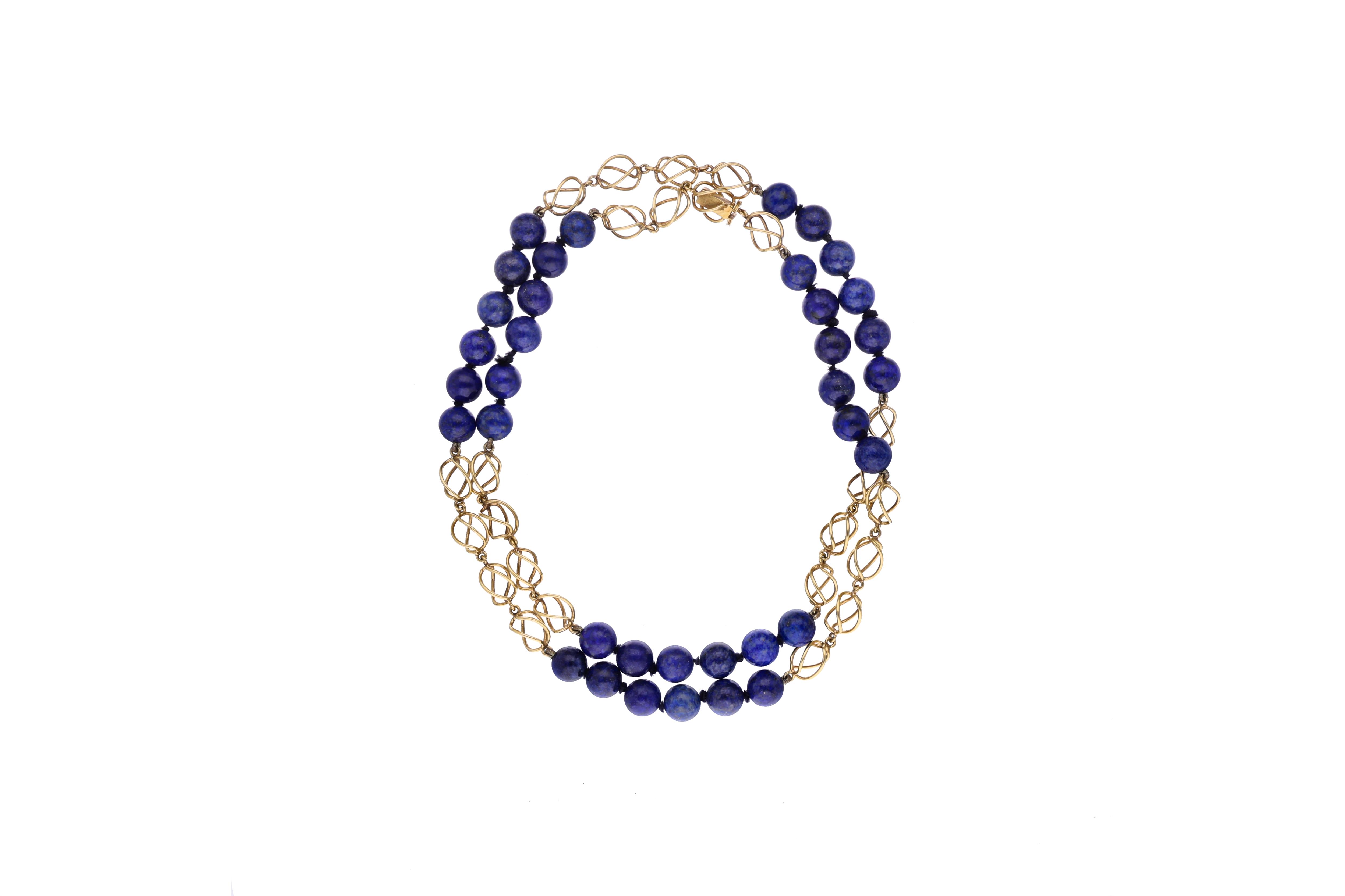 Collana con sfere in pietra - Asta Preziosi
