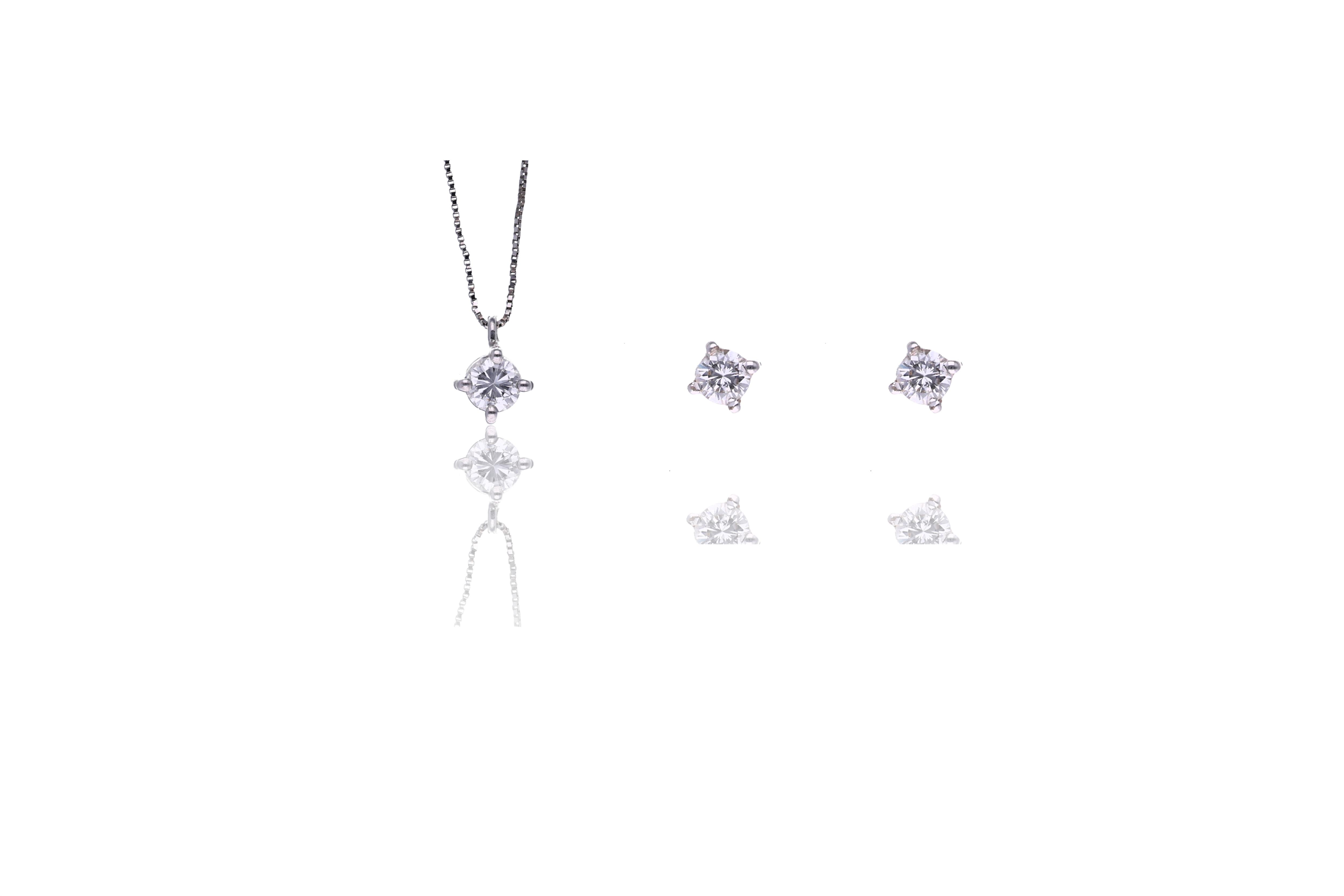 Collana punto luce e paio di orecchini con diamanti - Asta Preziosi