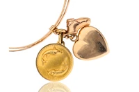 Bracciale con ciondoli in oro - Asta Preziosi