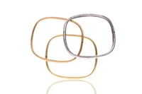 Tre bracciali rigidi in oro - Asta Preziosi