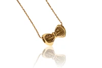 Collana e ciondolo a forma di fiocco con diamanti - Asta Preziosi