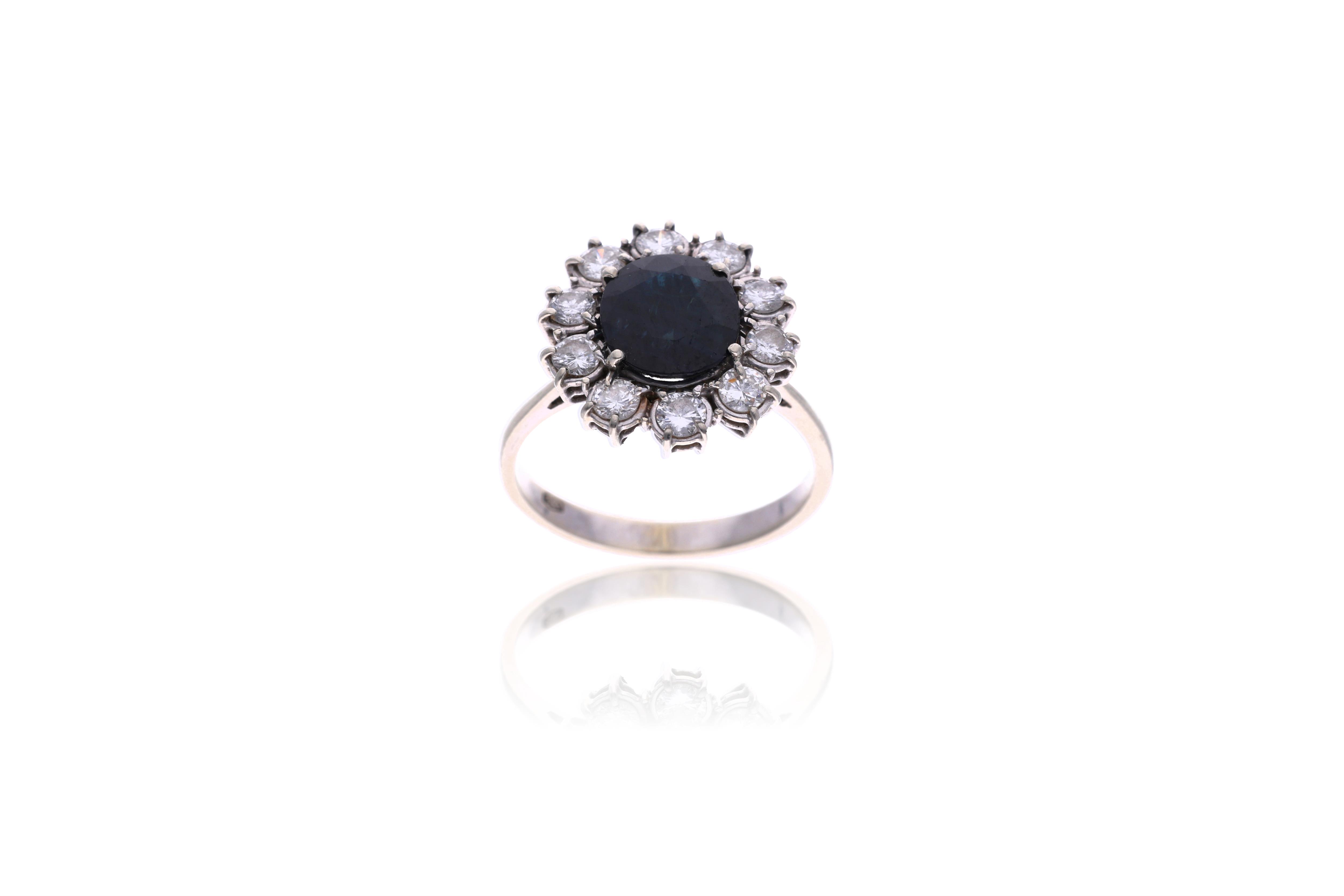 Anello con diamanti e zaffiro - Asta Preziosi