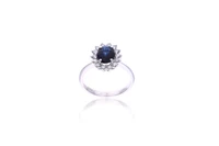 Anello con pietra e diamanti - Asta Preziosi Anello con pietra e diamanti - Asta Preziosi