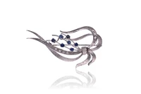 Spilla con diamanti e zaffiri - Asta Preziosi Spilla con diamanti e zaffiri - Asta Preziosi