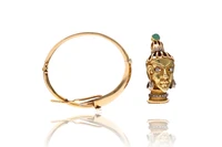 Bracciale rigido con elemento scomponibile in spilla - Asta Preziosi Bracciale rigido con elemento scomponibile in spilla - Asta Preziosi