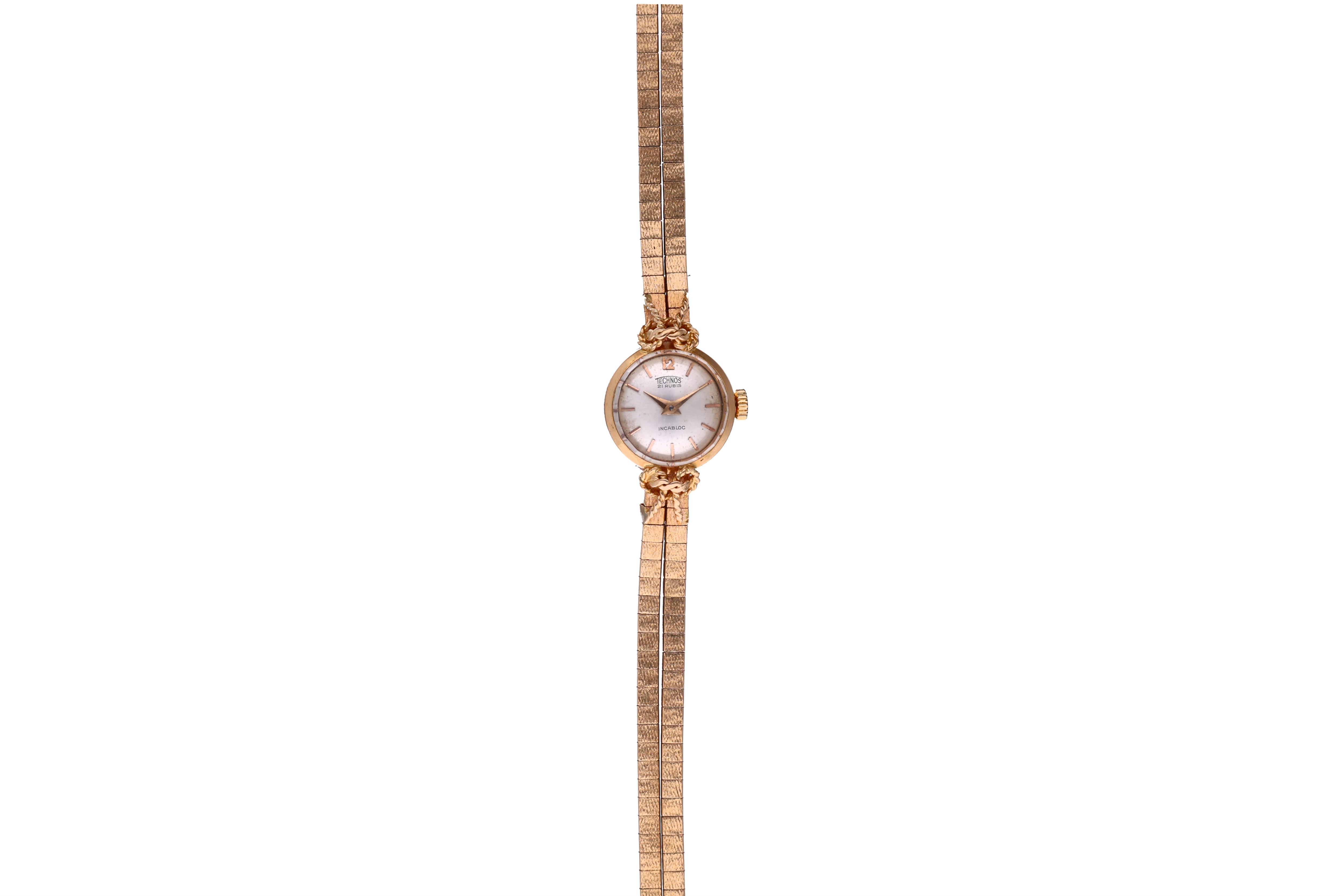 Technos, orologio in oro - Asta Preziosi