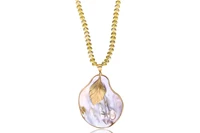 Collana e ciondolo con pietre e madreperla - Asta Preziosi Collana e ciondolo con pietre e madreperla - Asta Preziosi