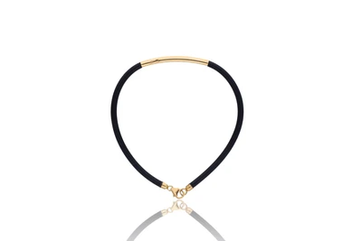 Bracciale in caucciu' con elementi in oro - Asta Preziosi Bracciale in caucciu' con elementi in oro - Asta Preziosi