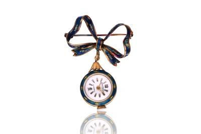 Spilla con orologio in oro - Asta Preziosi Spilla con orologio in oro - Asta Preziosi