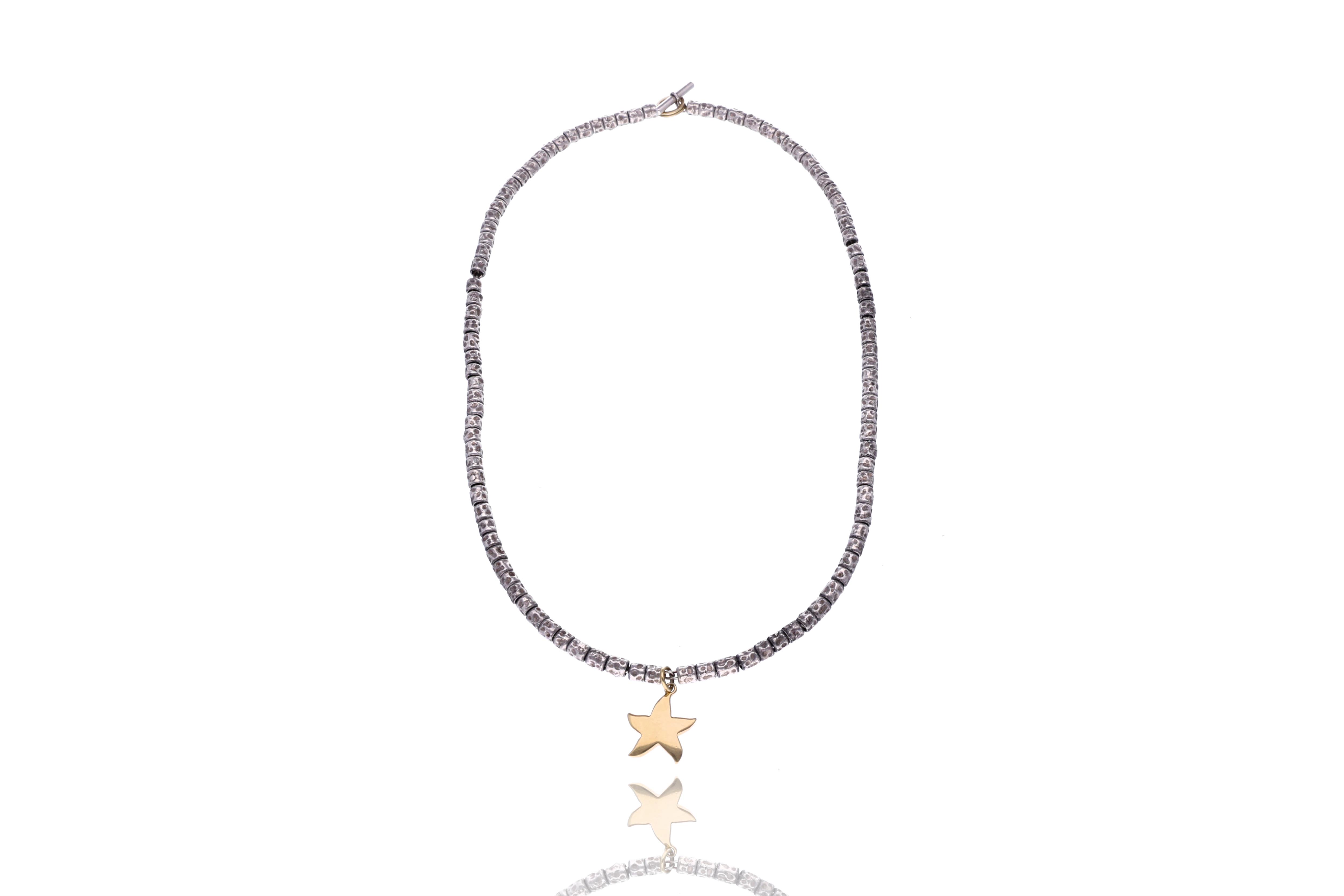 Dodo, collana in argento e oro - Asta Preziosi