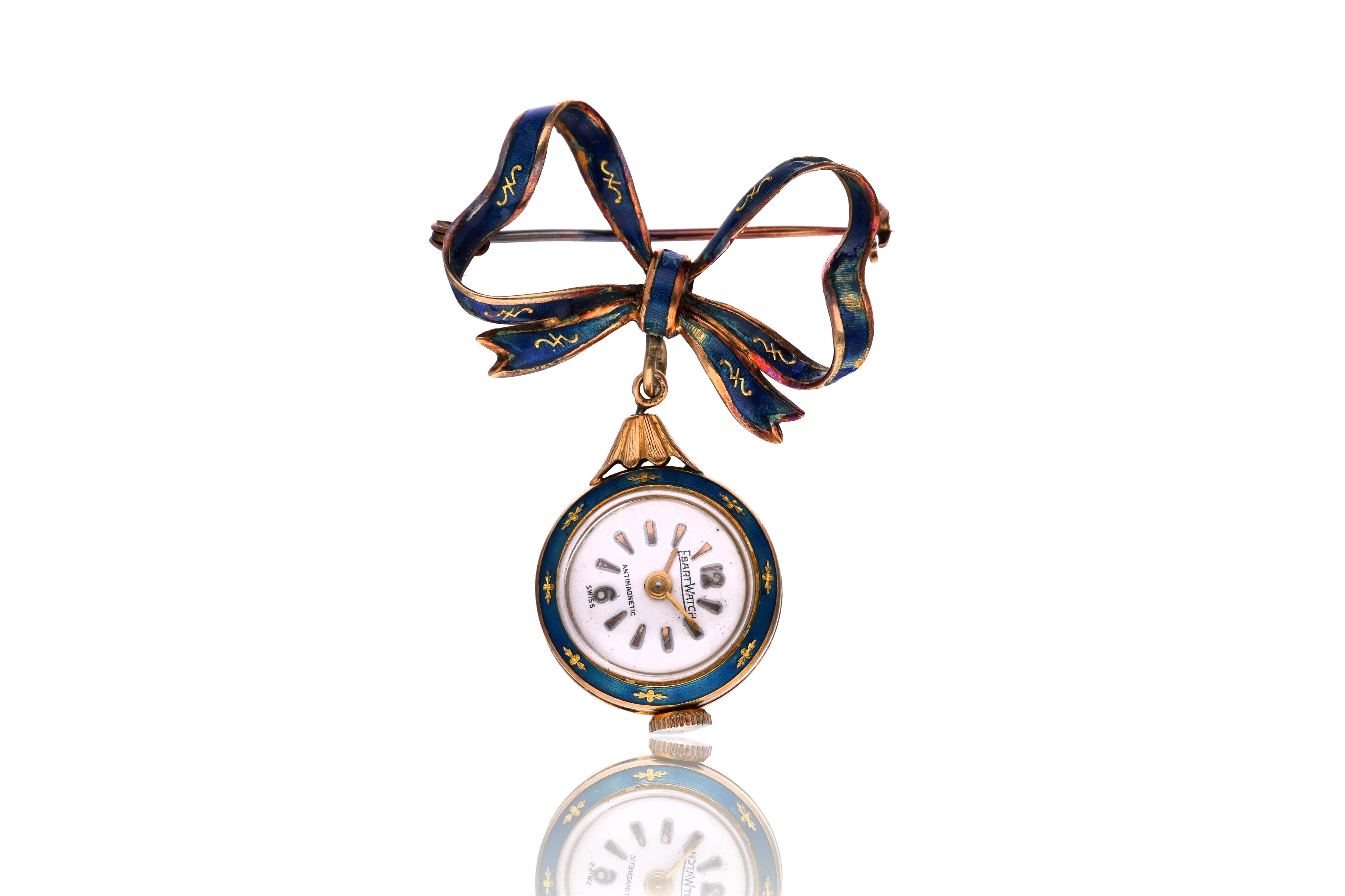 Spilla con orologio in oro - Asta Preziosi