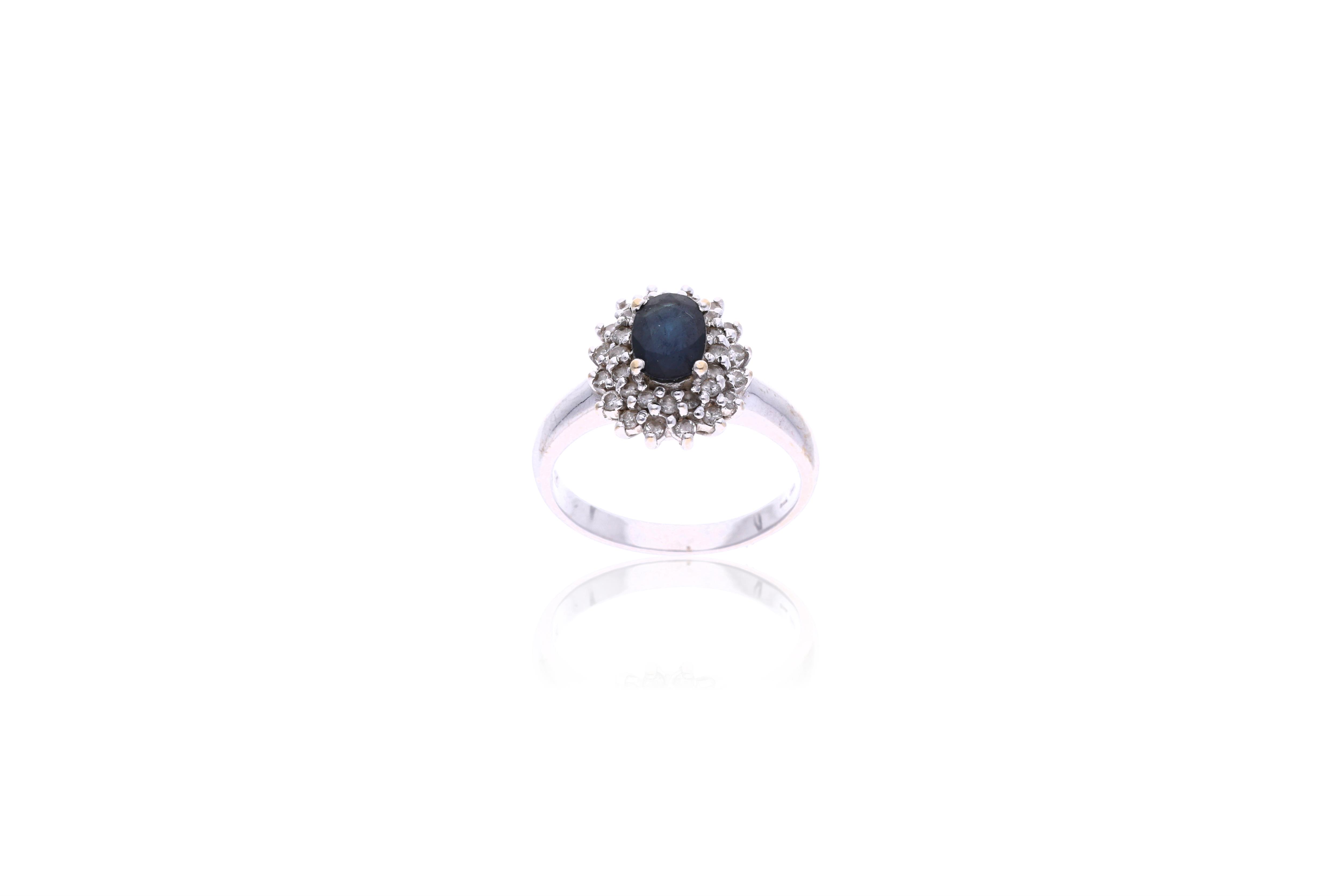Anello con diamanti e zaffiro - Asta Preziosi