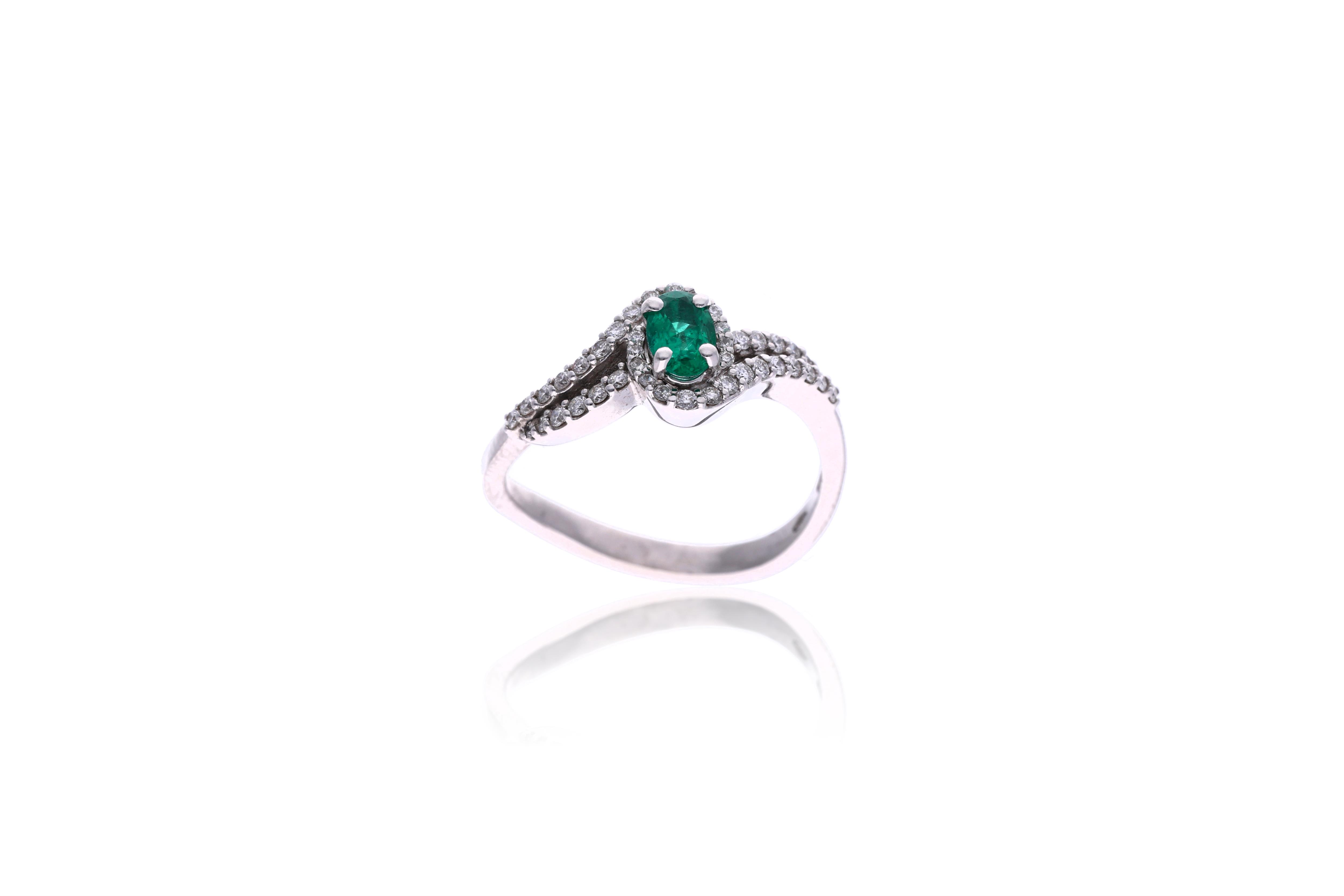 Anello con smeraldo e diamanti - Asta Preziosi