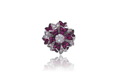 Spilla con rubini e diamanti - Asta Preziosi Spilla con rubini e diamanti - Asta Preziosi