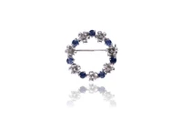 Spilla con diamanti e zaffiri - Asta Preziosi