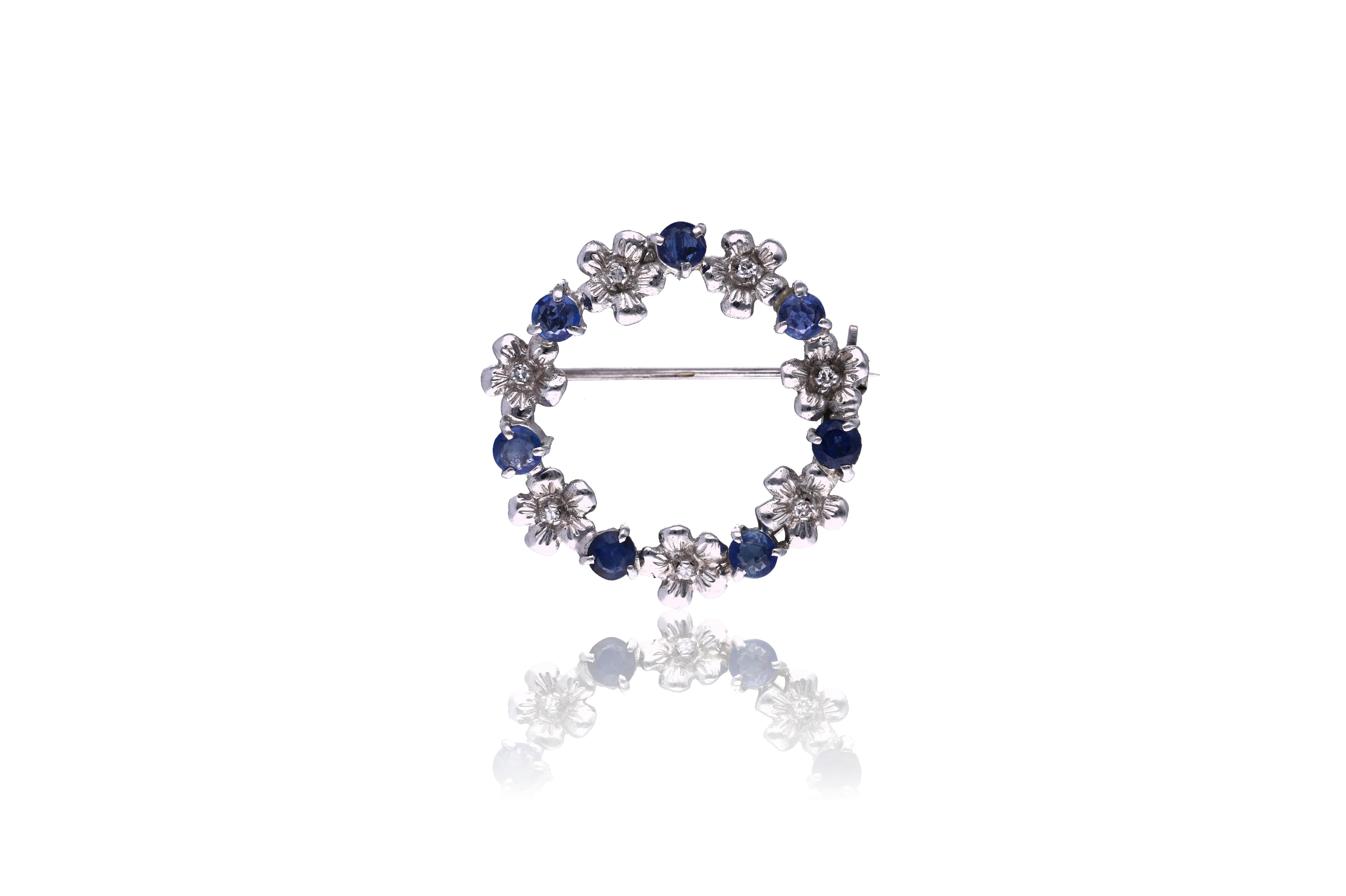 Spilla con diamanti e zaffiri - Asta Preziosi