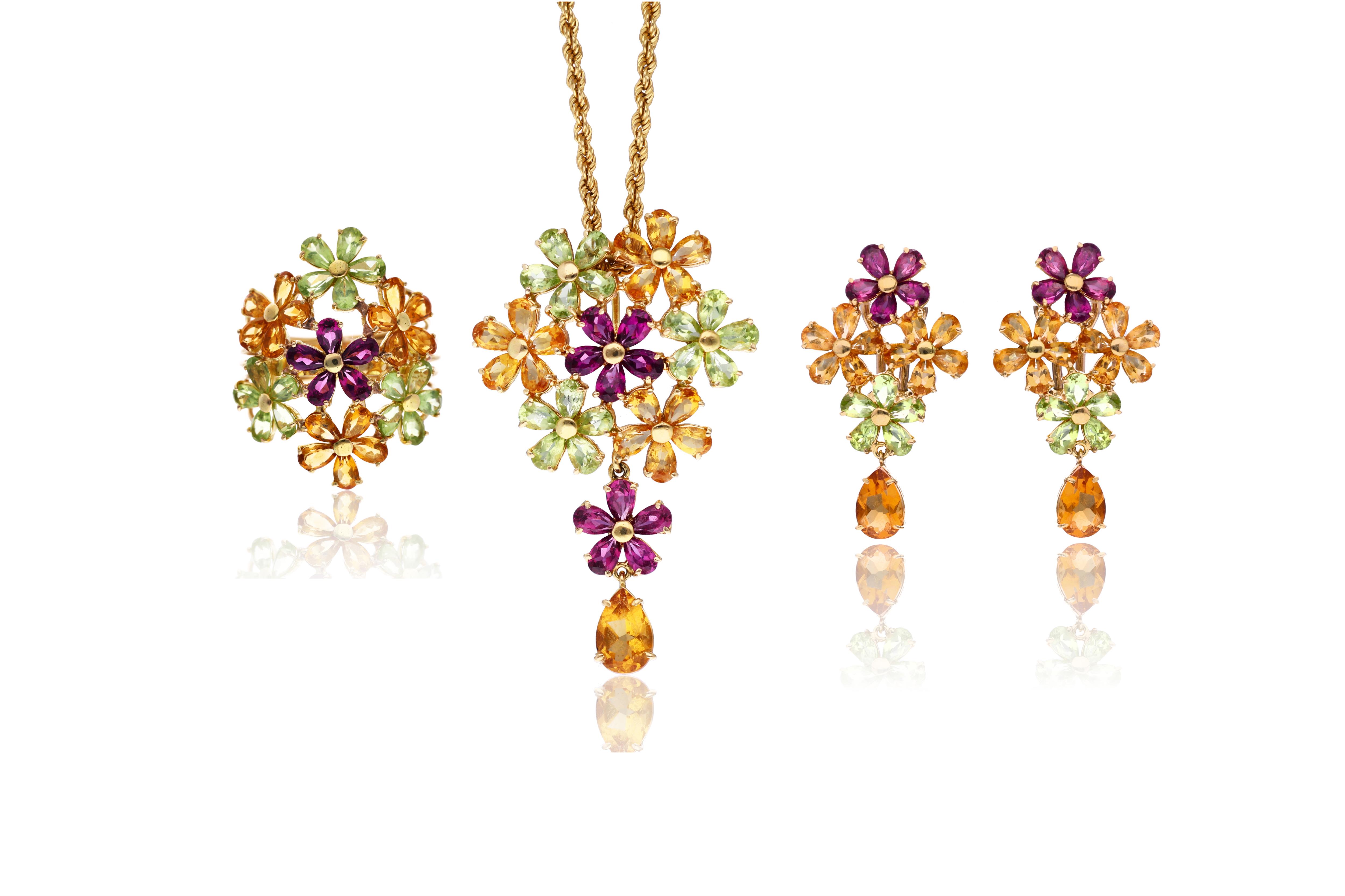 Parure: collana con pendente, paio di orecchini e anello con pietre - Asta Preziosi