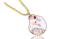 Collana e ciondolo con pietre e madreperla - Asta Preziosi