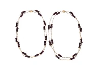 Due collane con inserti in granato - Asta Preziosi