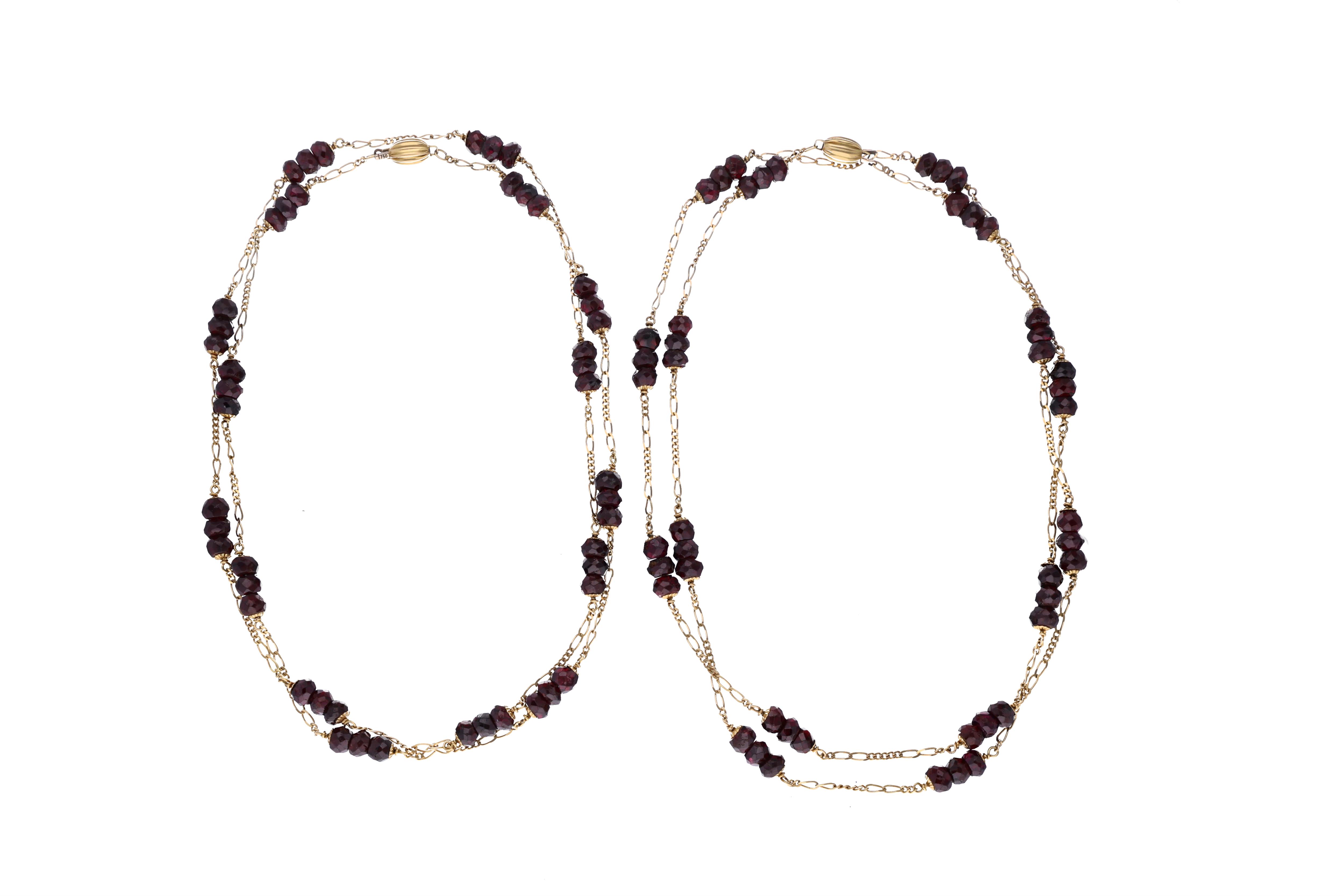 Due collane con inserti in granato - Asta Preziosi