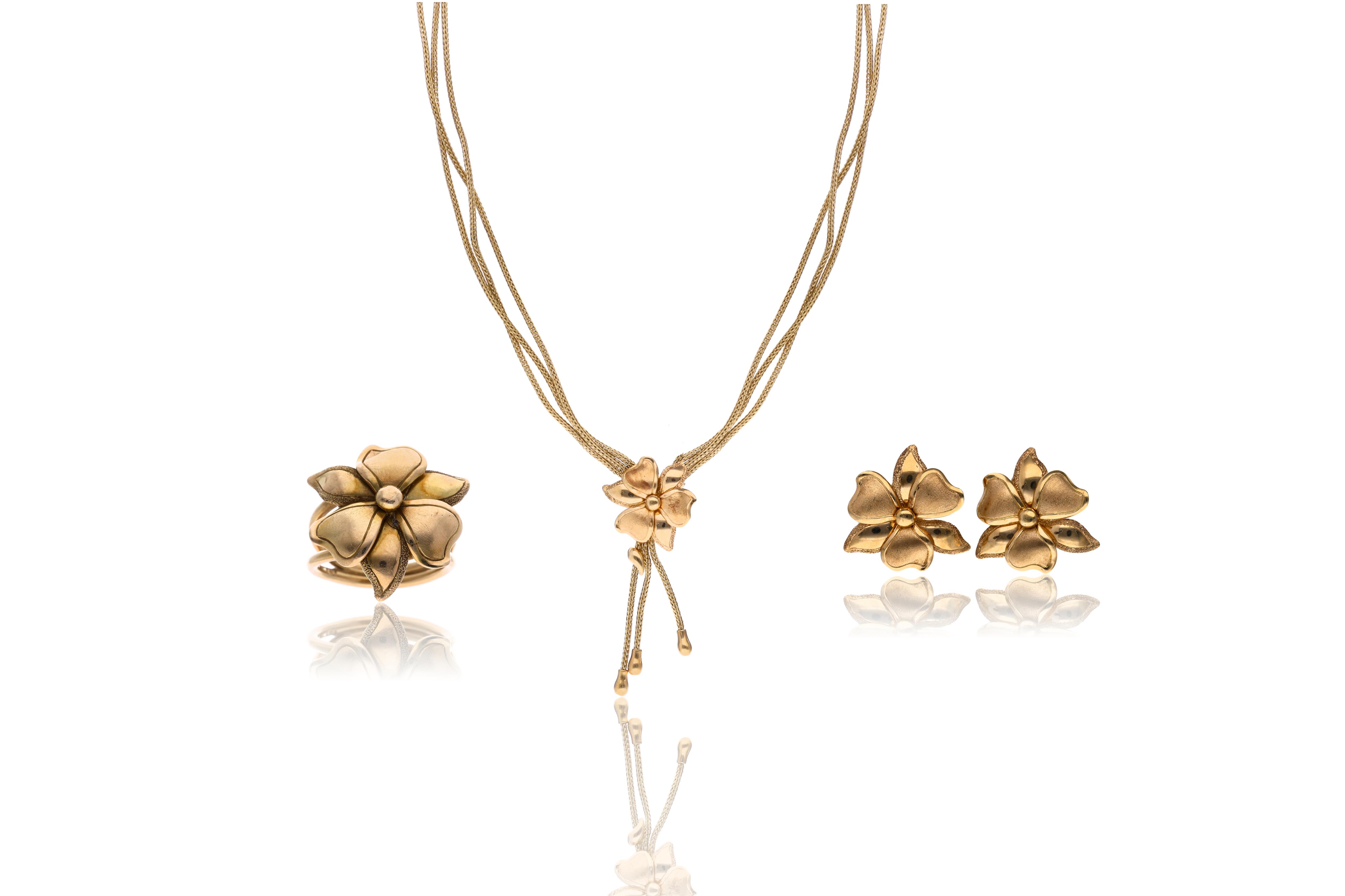 Demi parure con collana, anello e orecchini - Asta Preziosi