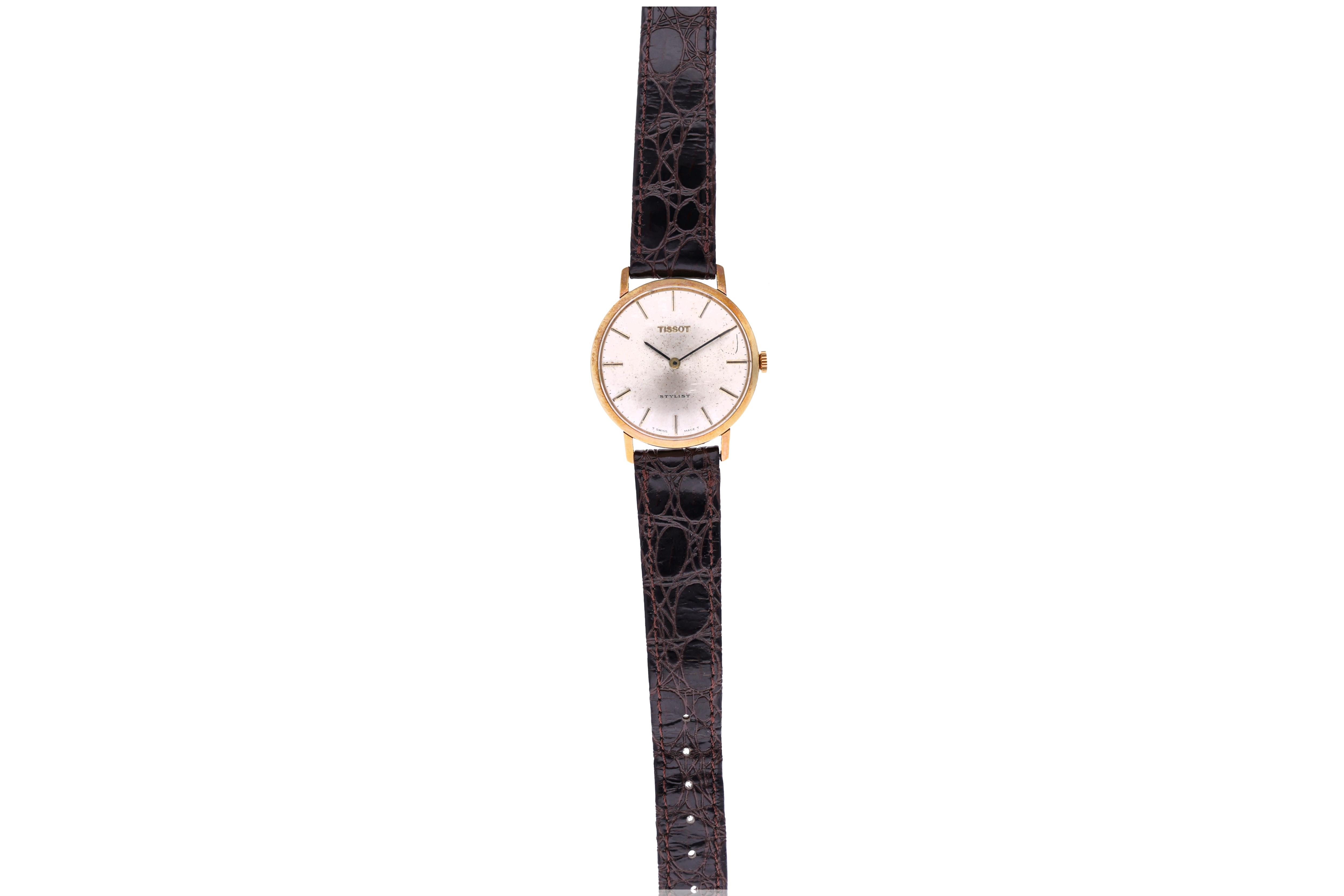 Tissot, orologio in oro - Asta Preziosi