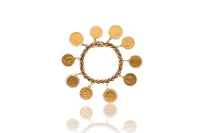 Bracciale con dieci ciondoli in oro - Asta Preziosi