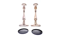 Greggio, coppia di candelieri in argento - Asta Preziosi