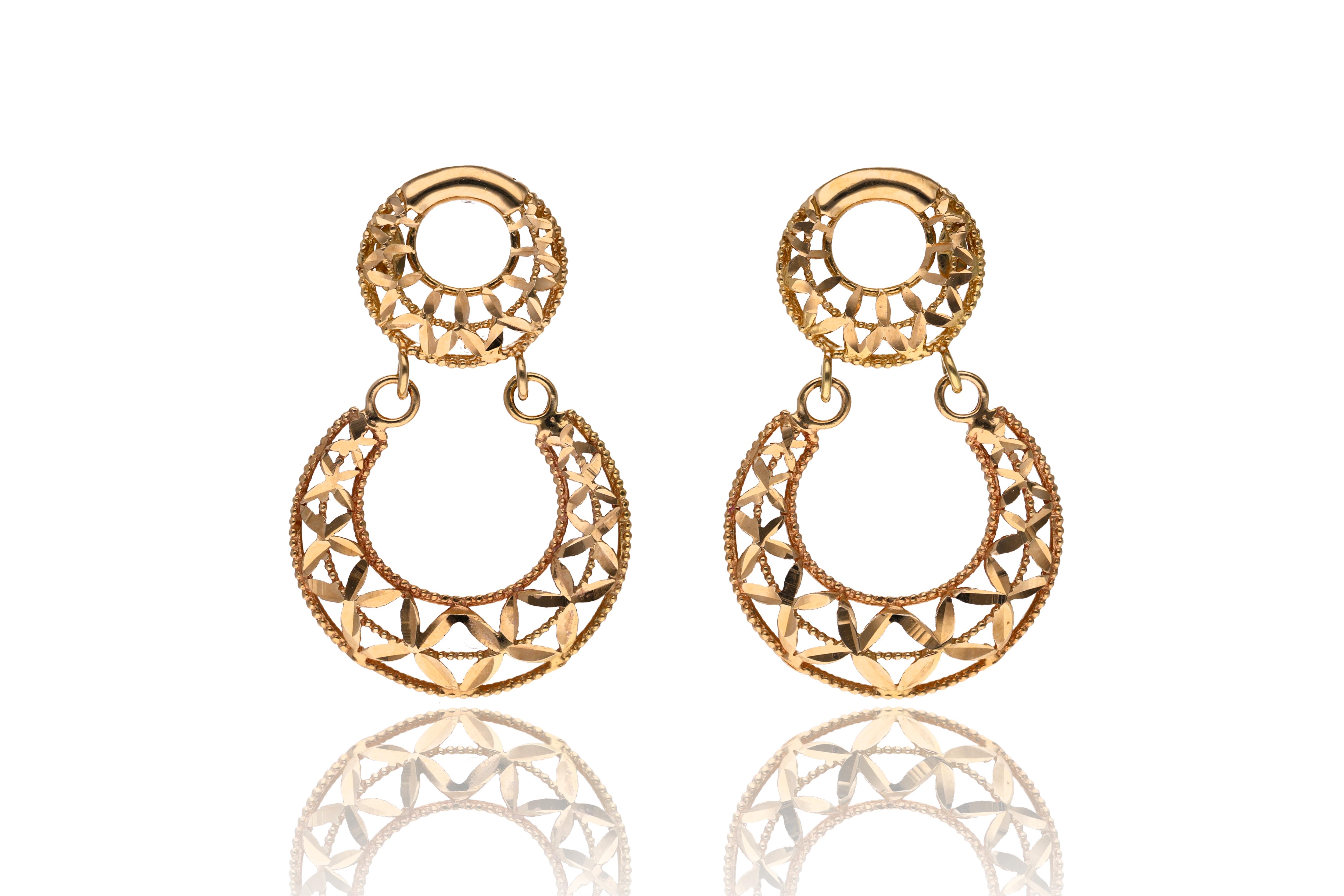 Paio di orecchini in oro - Asta preziosi