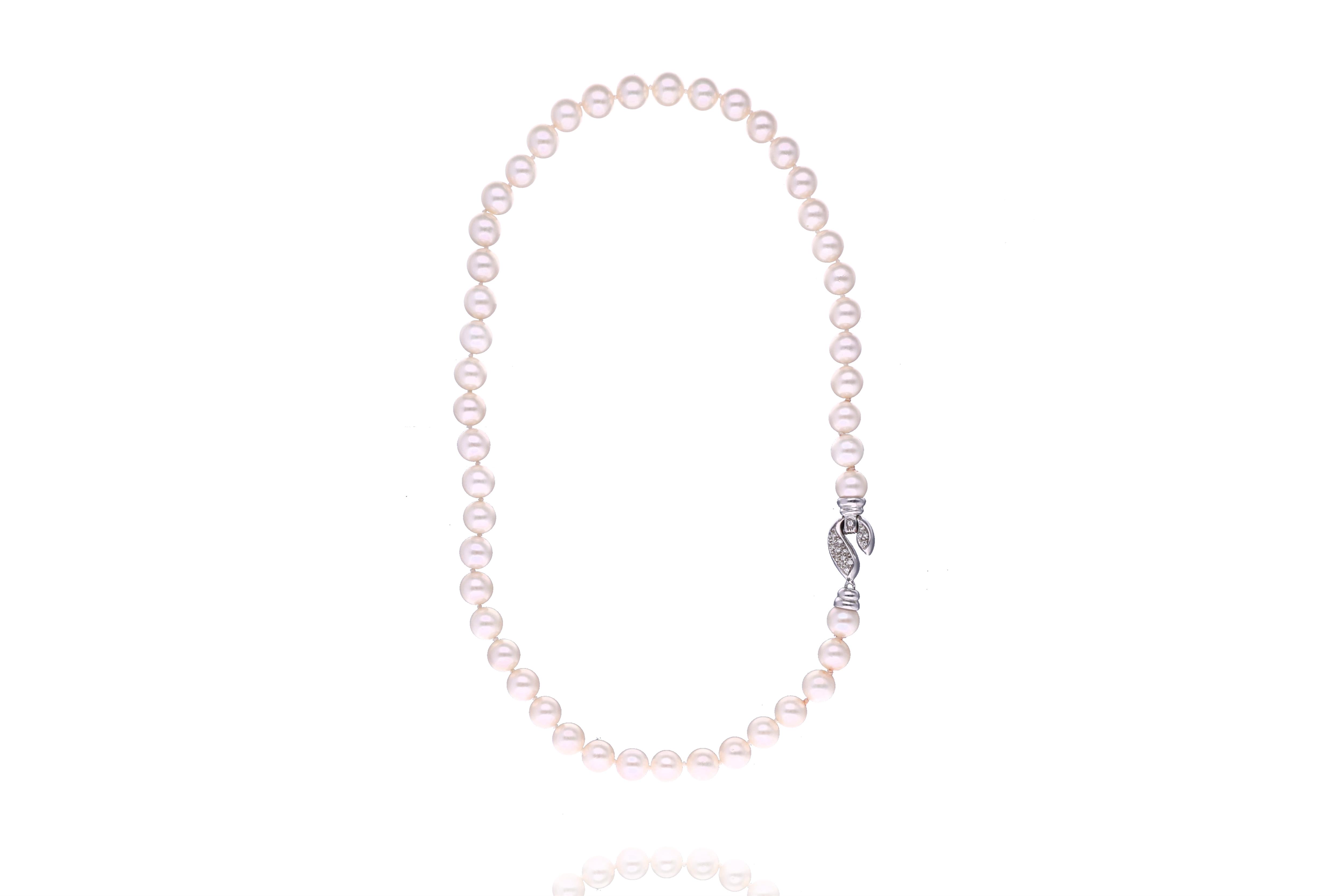 Collana di perle coltivate con diamanti - Asta Preziosi