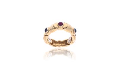 Anello snodato con zaffiri e rubino - Asta Preziosi