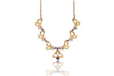 Collana in oro bicolore - Asta Preziosi