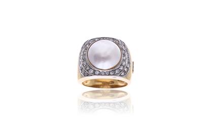 Anello in oro bicolore - Asta Preziosi