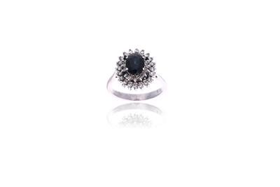 Anello con diamanti e zaffiro - Asta Preziosi Anello con diamanti e zaffiro - Asta Preziosi