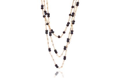 Lunga collana in oro con granati - Speciale Gioielli