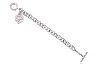 Tiffany e Co., collezione Return to Tiffany, bracciale con ciondolo a forma di cuore - Asta di San Valentino Tiffany e Co., collezione Return to Tiffany, bracciale con ciondolo a forma di cuore - Asta di San Valentino