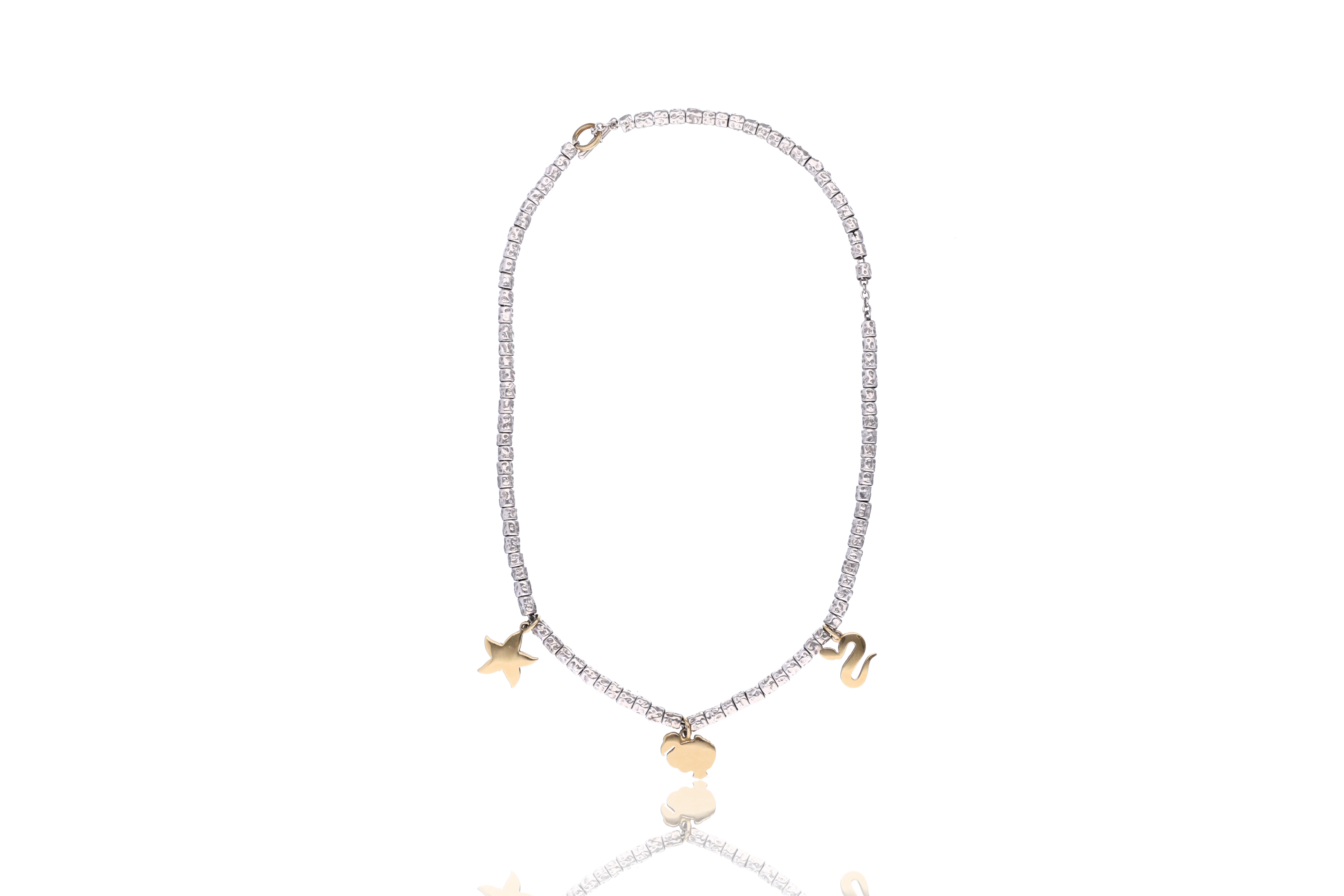 Pomellato Dodo, tre ciondoli in oro 750 con collana in argento 925 - Asta di Pasqua