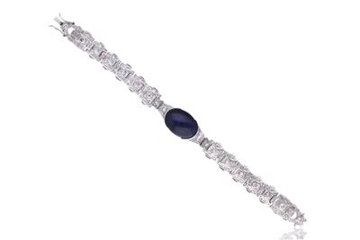 Bracciale con diamanti e pietra cabochon - Asta di Pasqua Bracciale con diamanti e pietra cabochon - Asta di Pasqua