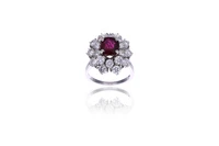 Anello con rubino e diamanti - Asta Orologi & Gioielli Anello con rubino e diamanti - Asta Orologi & Gioielli