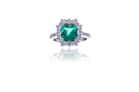 Anello con smeraldo e diamanti - Asta Orologi & Gioielli Anello con smeraldo e diamanti - Asta Orologi & Gioielli