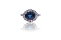 Anello con zaffiro e diamanti - Asta Orologi & Gioielli Anello con zaffiro e diamanti - Asta Orologi & Gioielli