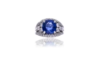Anello con zaffiro e diamanti - Asta Orologi & Gioielli Anello con zaffiro e diamanti - Asta Orologi & Gioielli