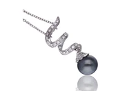 Collana e ciondolo con perla Tahiti e diamanti - Asta Orologi & Gioielli Collana e ciondolo con perla Tahiti e diamanti - Asta Orologi & Gioielli