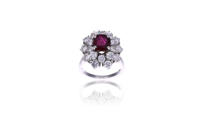 Anello con rubino e diamanti - Asta Orologi & Gioielli Anello con rubino e diamanti - Asta Orologi & Gioielli