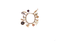 Bracciale con ciondoli in oro - Asta Speciale Tesori d'Autunno