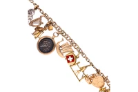 Bracciale con ciondoli in oro - Asta Speciale Tesori d'Autunno