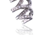 Damiani, orecchini a spirale con diamanti - Asta Speciale Tesori d'Autunno