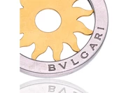 Bulgari, ciondolo sole in oro e acciaio - Asta Speciale