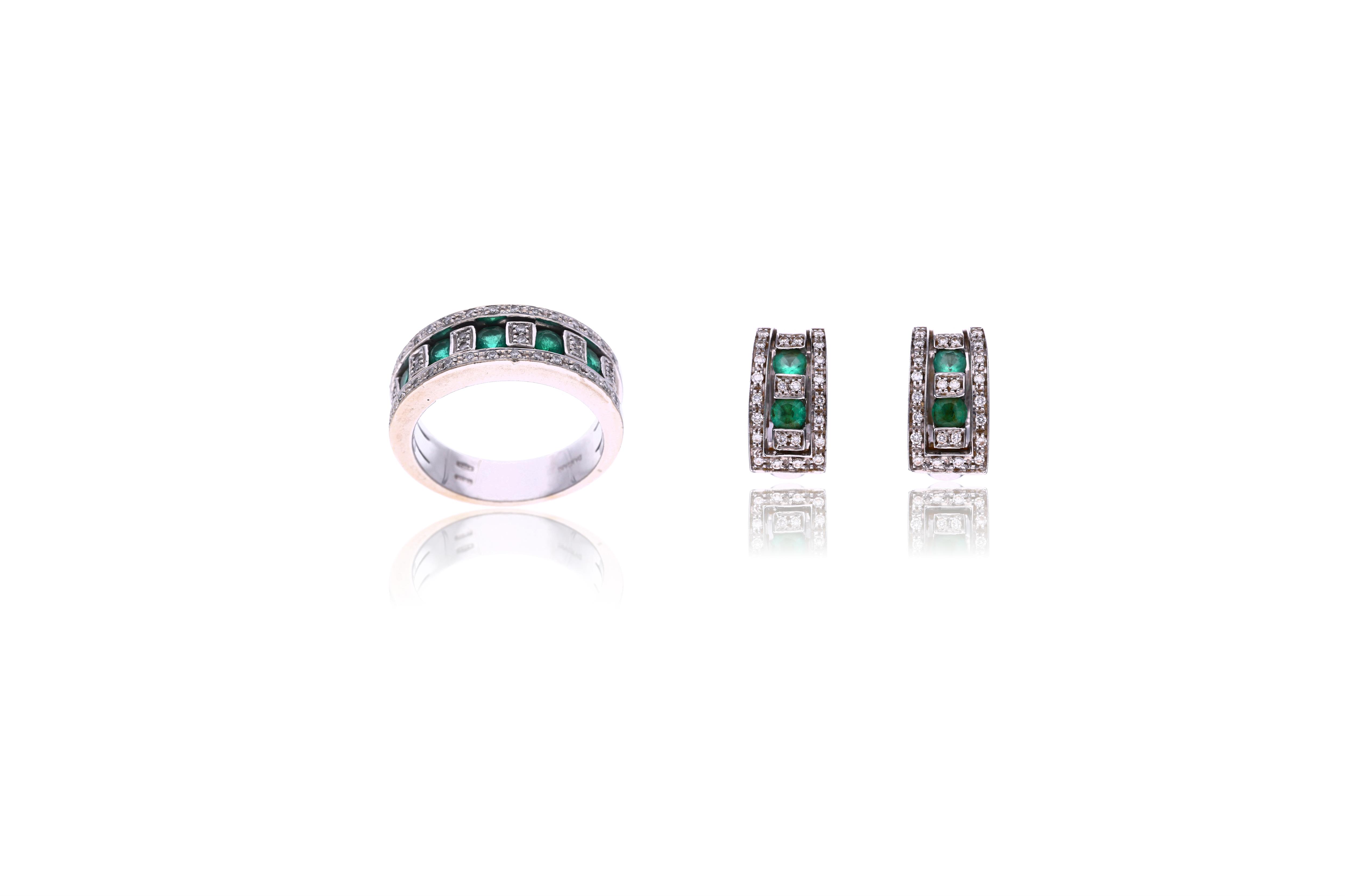 Damiani, anello e paio di orecchini con diamanti e smeraldi - Asta Speciale