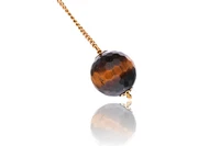 Paio di orecchini con occhio ti tigre - Asta Speciale San Valentino